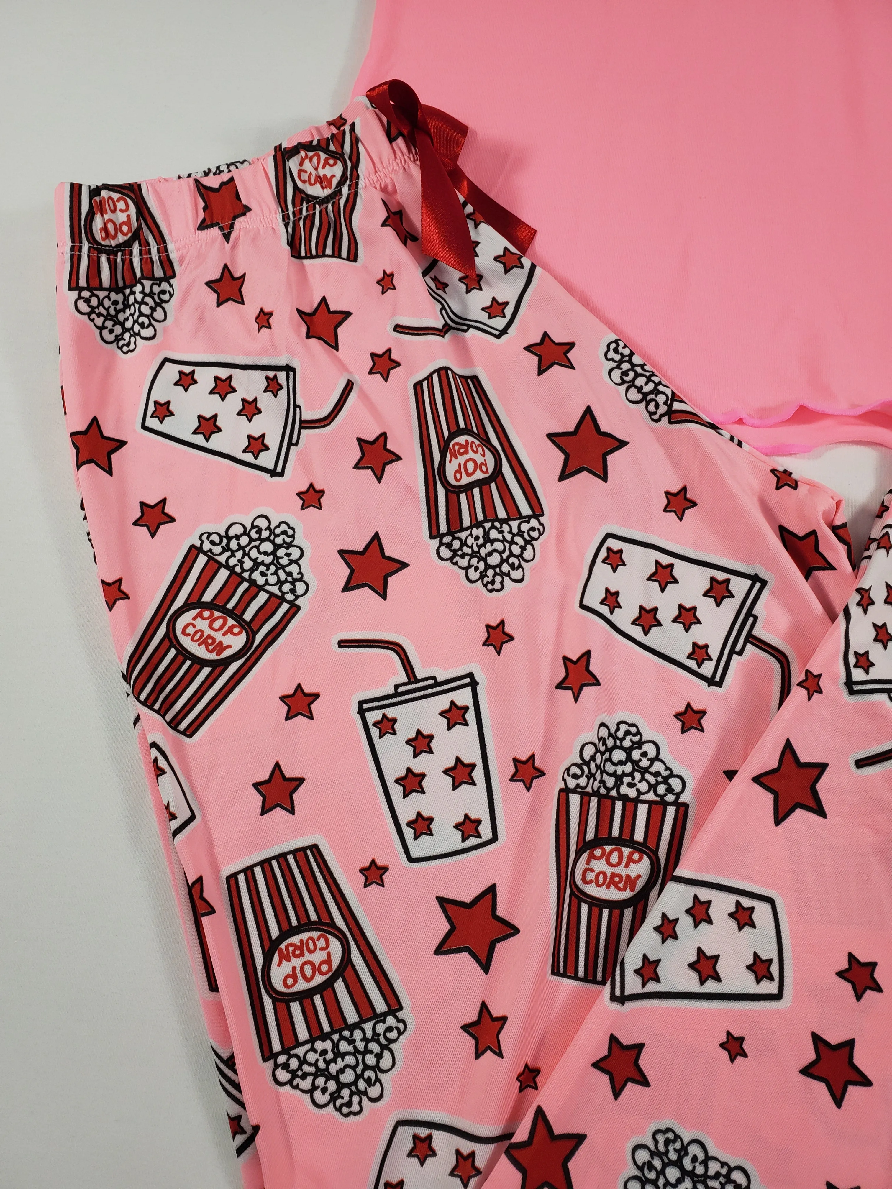 Women's Pajama set pink pants stars and popcorn theme pink blouse